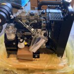 CAT C1.1 / Perkins 403A-11 dzinējs ar radiatoru - skats no sāniem