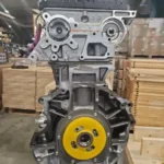 Ford Transit 2.2 TDCi FWD garais bloks – cilindra galva ar FWD marķējumu, skats no aizmugures.
